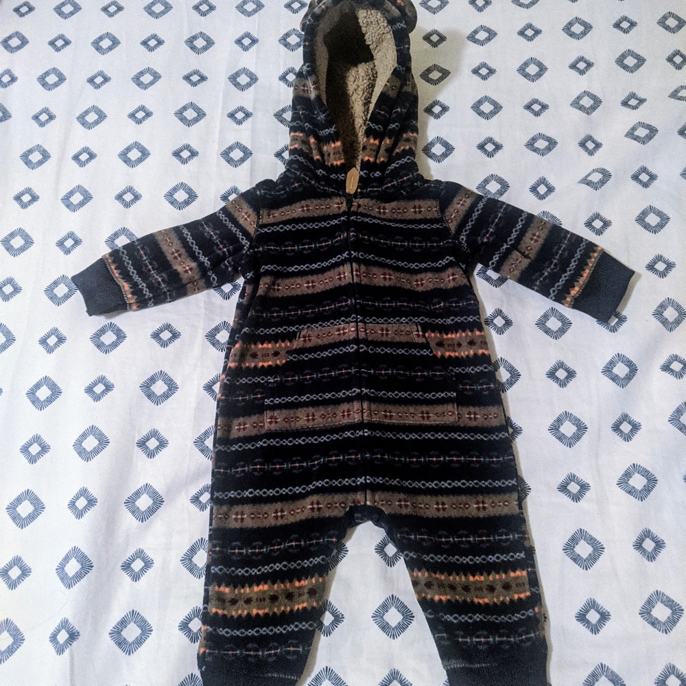 Bundle of baby footed one pieces.